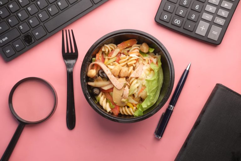 A Bowl of Food on the Pink Table